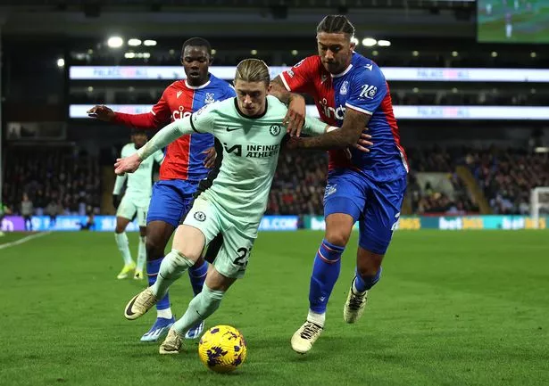 LONDON, ENGLAND - FEBRUARY 12: Conor Gallagher of Chelsea holds off Chris Richards of Crystal Palace during the Premier League match between Crystal Palace and Chelsea FC at Selhurst Park on February 12, 2024 in London, England. (Photo by Chris Lee - Chelsea FC/Chelsea FC via Getty Images)